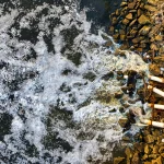 PENGELOLAAN AIR ASAM TAMBANG (AAT) UNTUK MENCEGAH RISIKO LINGKUNGAN